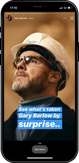 Gary Barlow in hard hat on mobile mockup